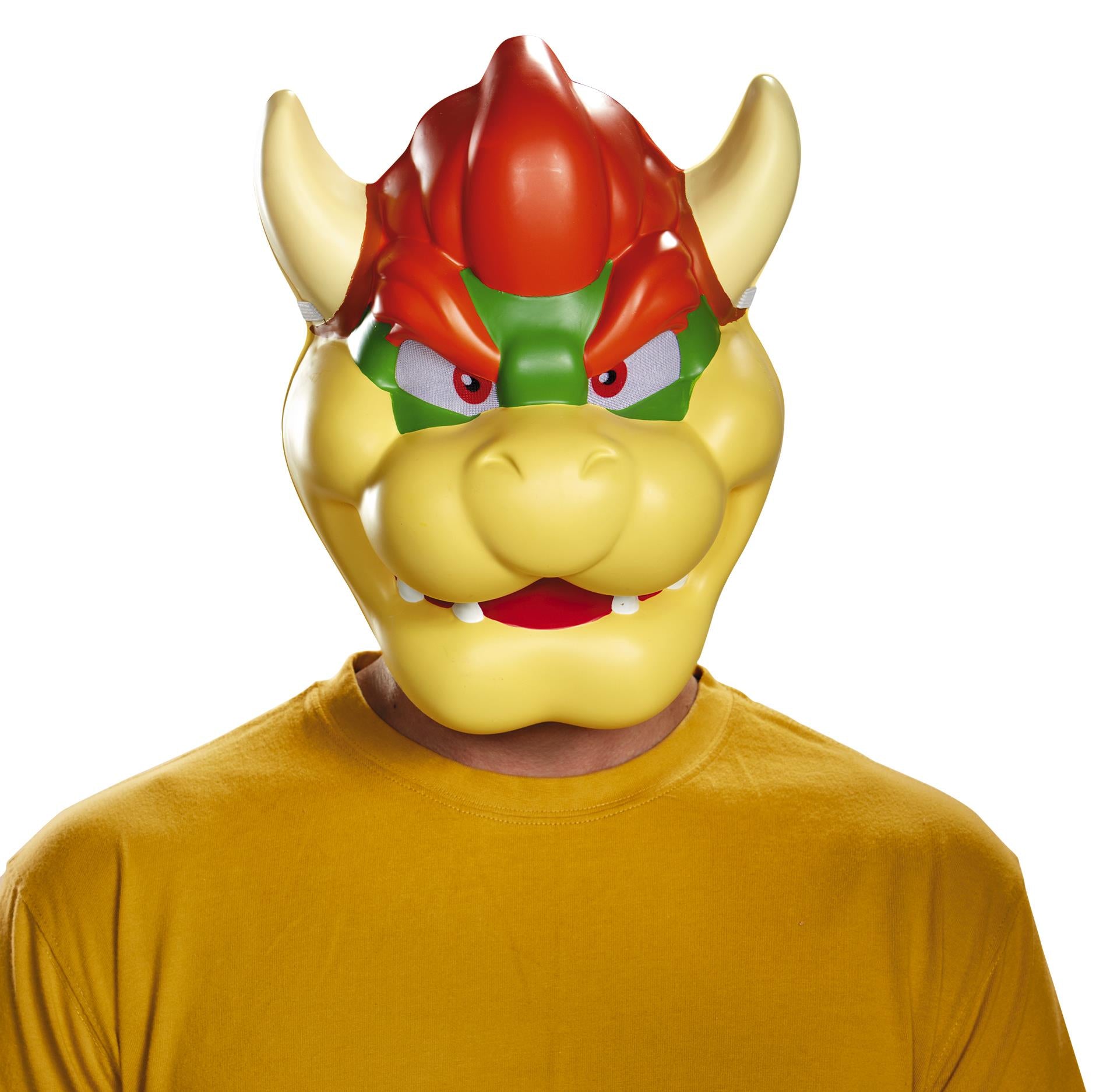 Adult wearing a Super Mario Brothers Bowser mask with a fierce expression, predominantly yellow with red and green accents on the face.