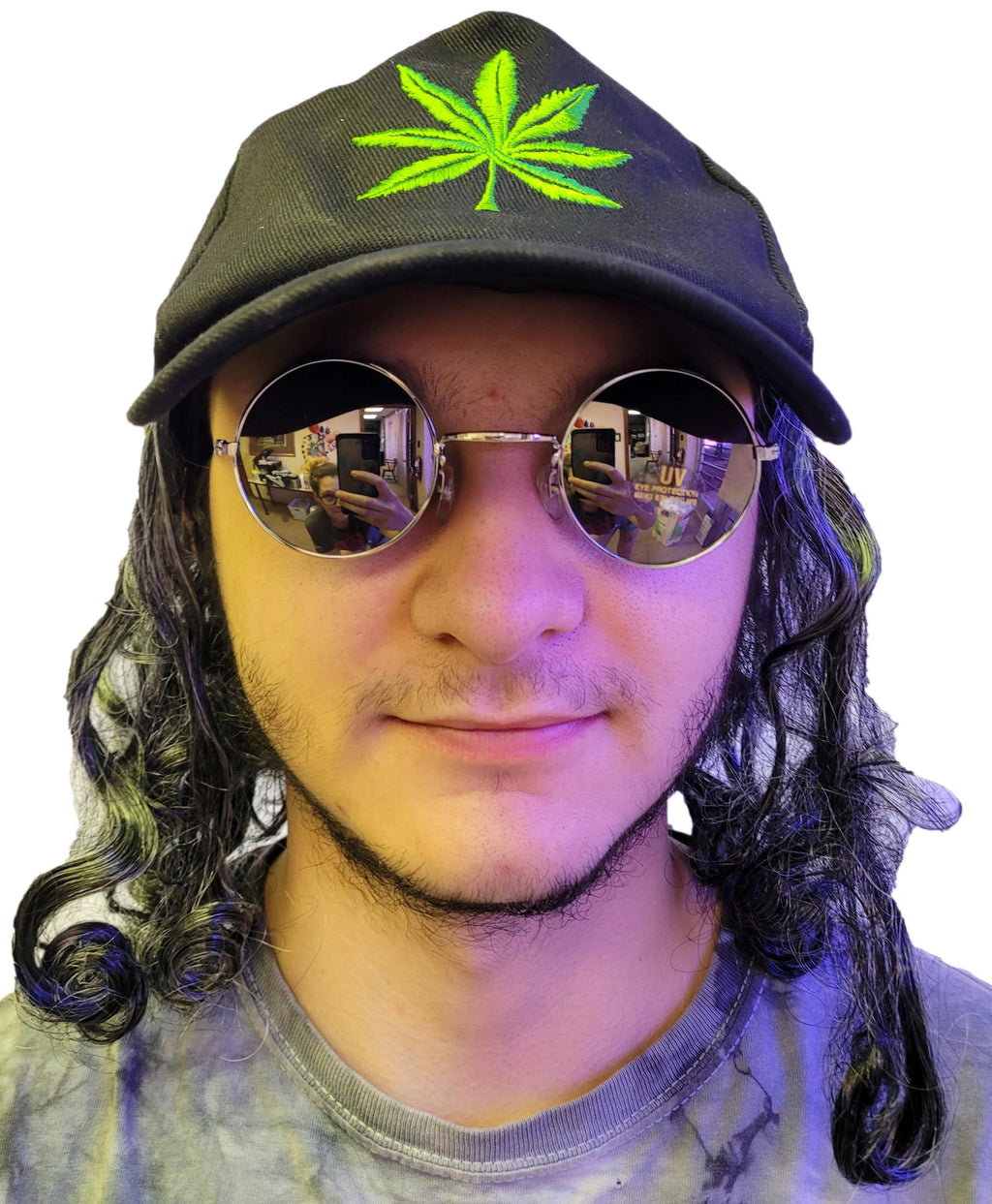 This image features a unique and playful baseball cap, designed with a bold marijuana leaf motif on the front. The cap is styled in a versatile black color and comes with an attached gray shoulder-length hair, creating a striking contrast.