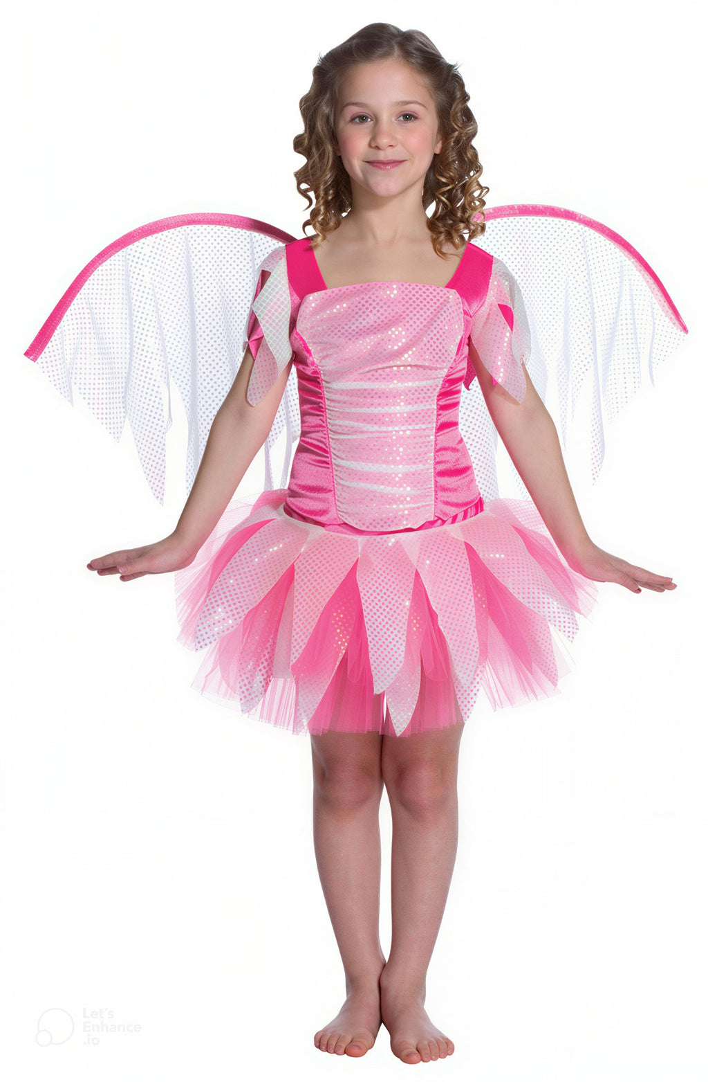 A young girl modeling a pink and white fairy costume with a sparkly corset bodice, layered tulle skirt, and white mesh wings with pink trim.