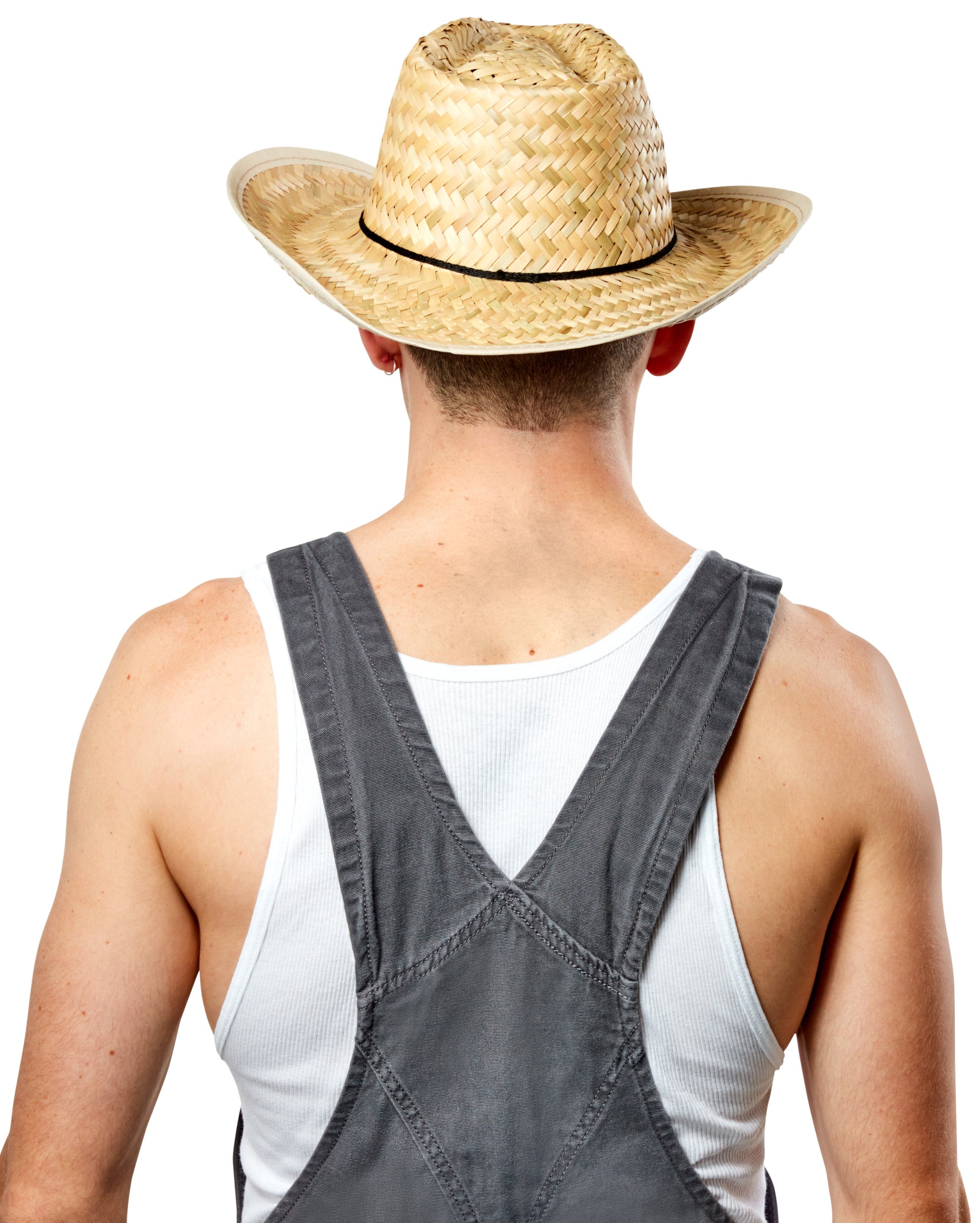 Person back side view wearing a straw hat and denim overalls on a white background